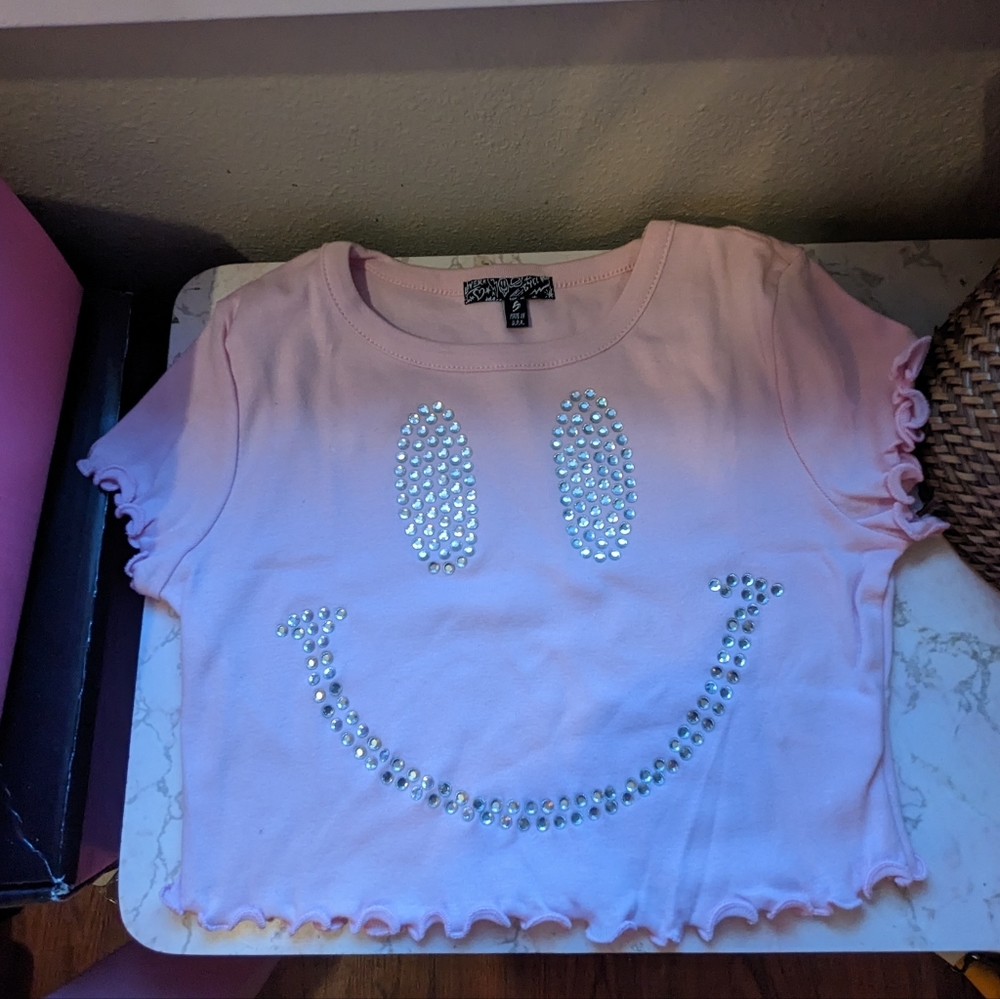 Y2K inspired pastel pink rhinestone smiley face crop top